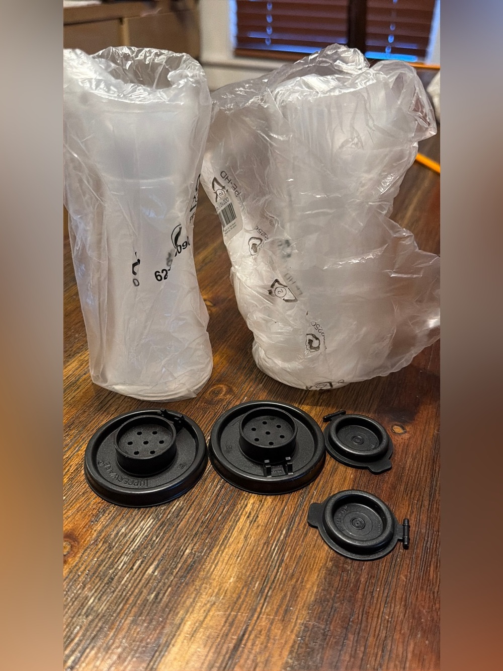 Tupperware clear w black seals Salt & Pepper Shakers new
